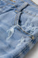 Beau Blue Asymmetric Raw Hem Distressed Whiskery Denim Shorts