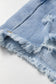 Beau Blue Asymmetric Raw Hem Distressed Whiskery Denim Shorts