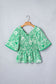 Green Flirty Floral Smocked V Neck Blouse